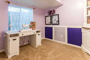 Home office / Sewing Room / Basement bedroom with light carpet