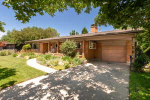 All brick rambler home with a large attached garage.  Plenty of room in driveway for second car.