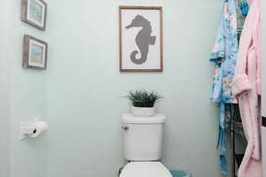 Half bathroom featuring toilet