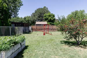 View of fenced backyard