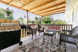 Wooden terrace with area for grilling