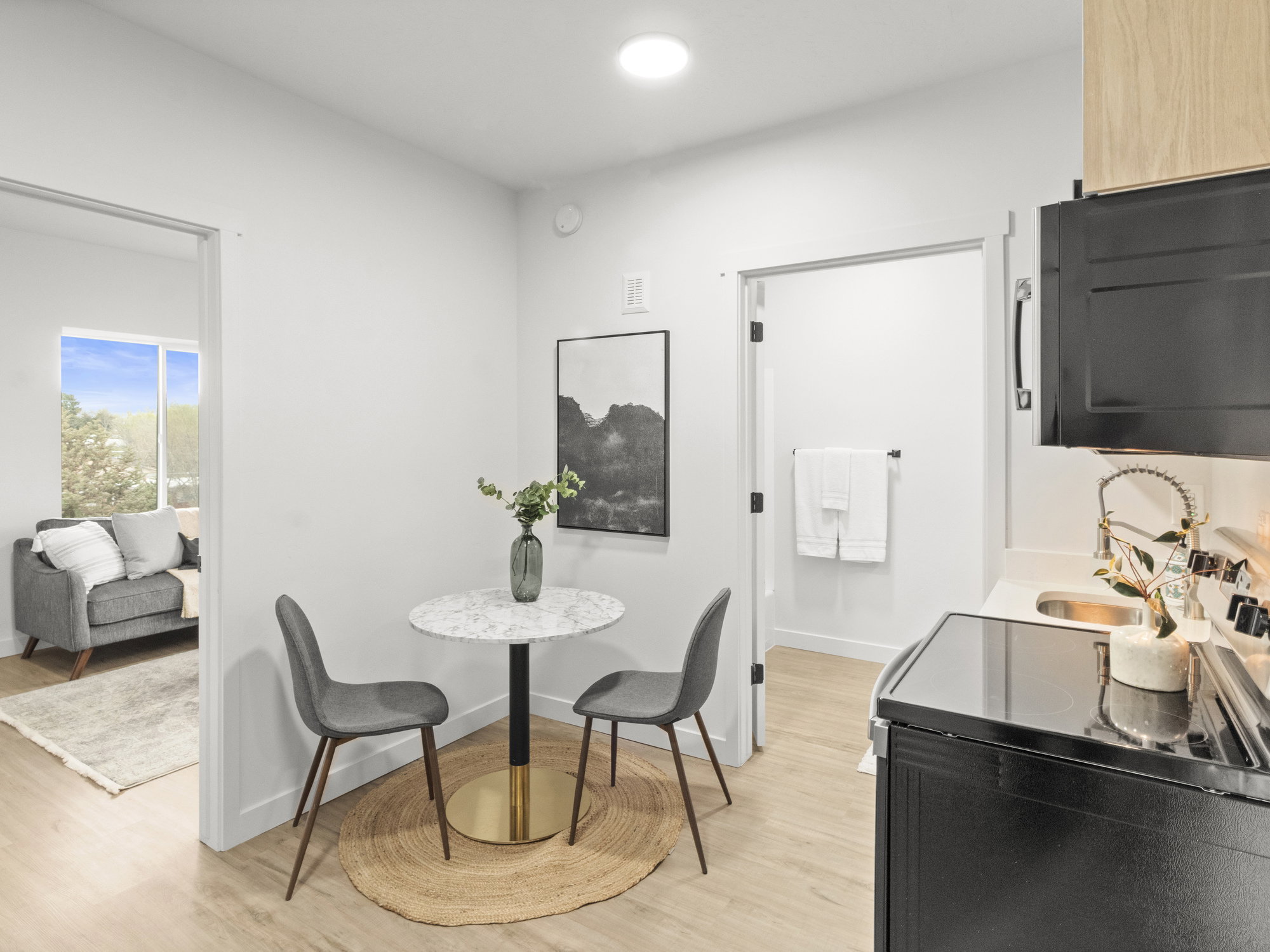 Dining room featuring light wood-type flooring and recessed lighting
