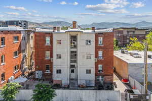 View of apartment building / complex with a mountain view