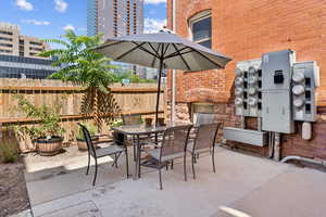 View of patio with outdoor dining area
