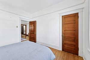 Bedroom featuring wood finished floors