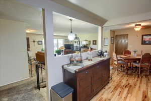 Kitchen & dining with hardwood flooring
