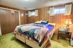 Bedroom featuring carpet.