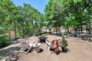 View of yard featuring a fire pit