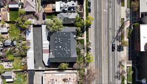 Aerial view of property's location with nearby suburban area