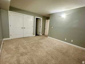 Master bedroom- Unfurnished bedroom with carpet and a closet