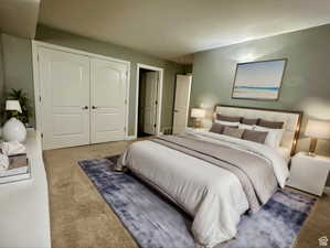 (virtually staged) Master bedroom- Carpeted bedroom featuring a closet