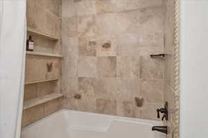 Bathroom featuring shower / bathtub combination
