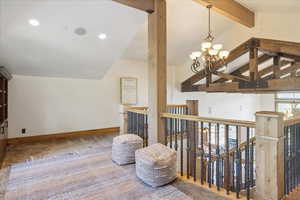 Bonus room featuring a chandelier and recessed lighting
