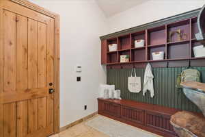Mudroom featuring baseboards