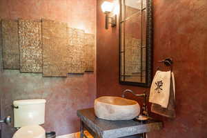 Bathroom with toilet and vanity