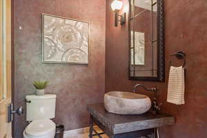Bathroom featuring a sink and toilet