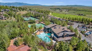 Bird's eye view of a pool area and mountains