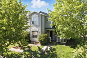 View of front of house with a front lawn