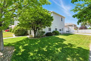 View of front facade with driveway and an attached garage