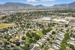 Aerial view of property's location featuring nearby suburban area