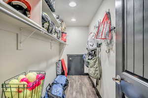 Spacious closet with wood finished floors