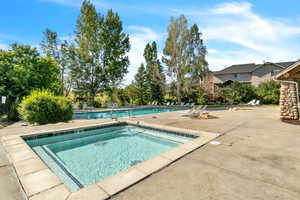 Community pool featuring a patio area