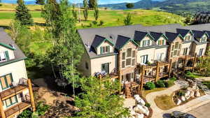 Aerial view of mountains and a golf club