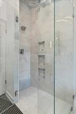 Full bath featuring a stall shower