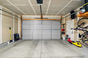 Garage featuring a garage door opener