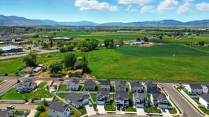Aerial view of residential area featuring a mountain backdrop