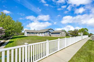 View of front of house featuring stone siding
