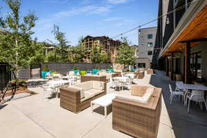 View of patio / terrace featuring outdoor dining area and an outdoor hangout area