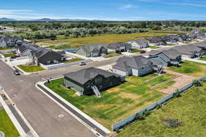 Aerial view of residential area featuring mountains