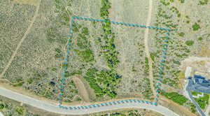 View of rural area with property boundaries highlighted and a desert landscape