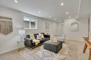 Living room featuring recessed lighting and carpet flooring
