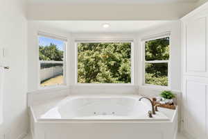 Bathroom with a jetted tub