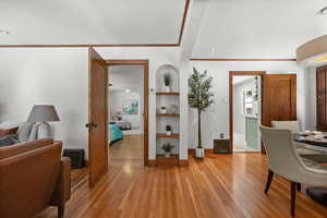 Entry area looking into two bedrooms and the kitchen.