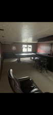 Dining room featuring carpet flooring and a textured ceiling
