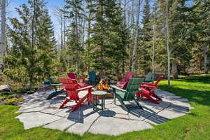 View of patio featuring a fire pit