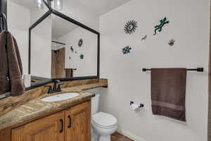 Bathroom with vanity and a shower