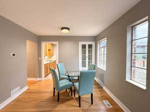 Dining room featuring light wood-type flooring