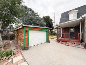 Detached garage with covered porch