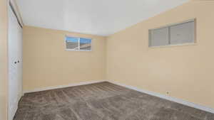 Unfurnished bedroom with carpet floors and a closet