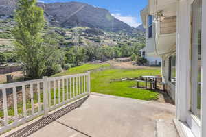 View of patio featuring a mountain view