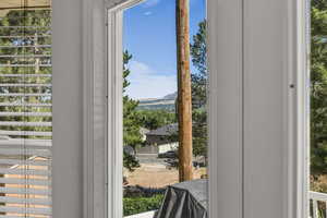 Doorway to outside with a mountain view