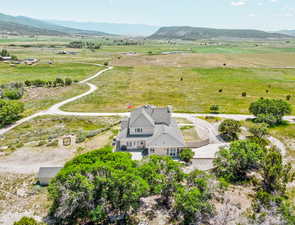 Aerial view of sparsely populated area featuring a mountain backdrop