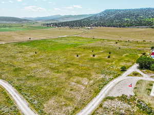 Aerial view of sparsely populated area with mountains