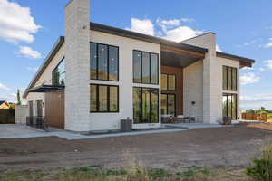 Back of property with a chimney