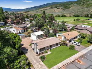 Aerial view of residential area with a mountain backdrop