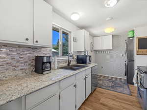 Kitchen with attached Laundry and backdoor entry area
